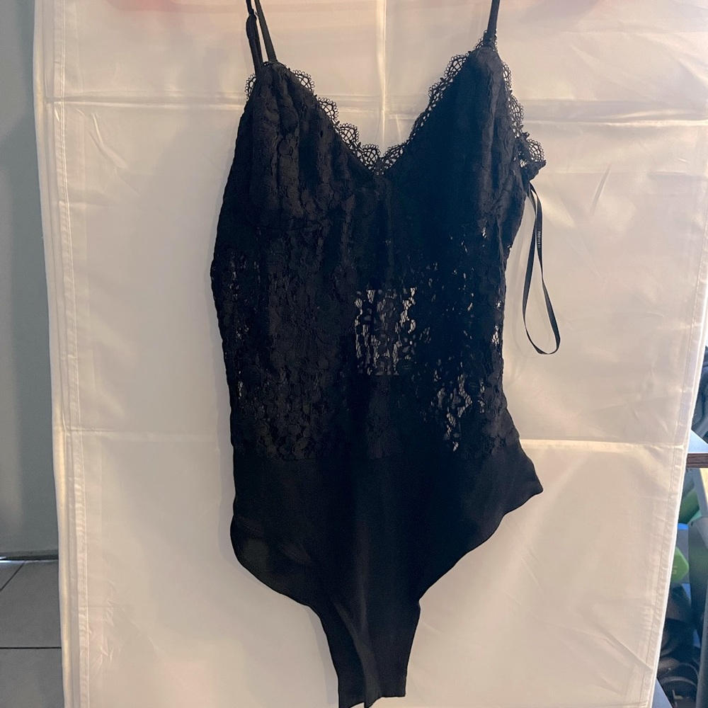 Forever 21 black bodysuit. NWT